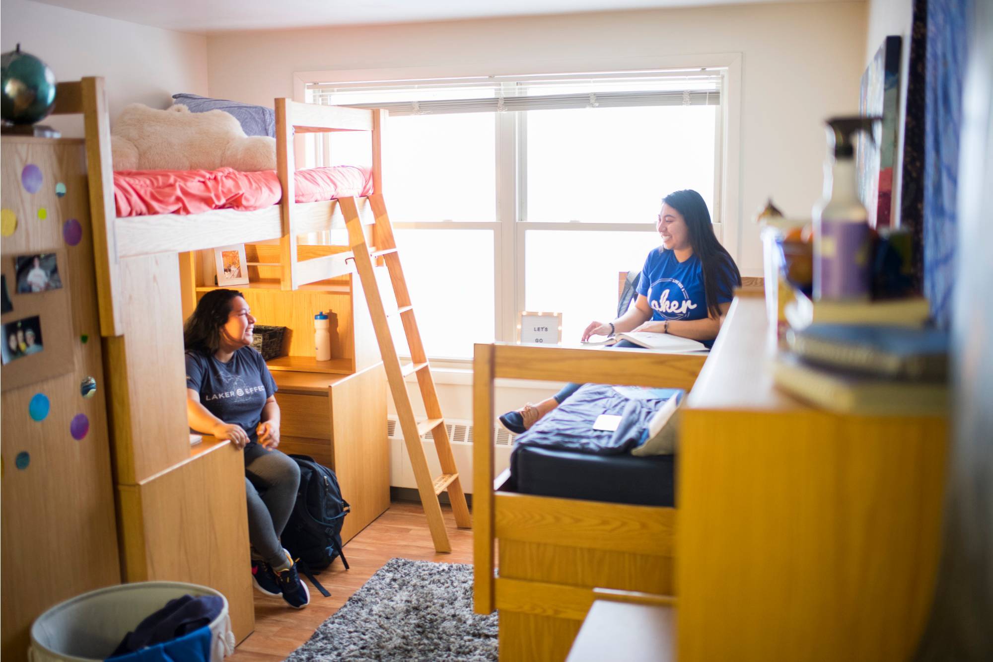 GVSU suite-style student residents studying in their room.